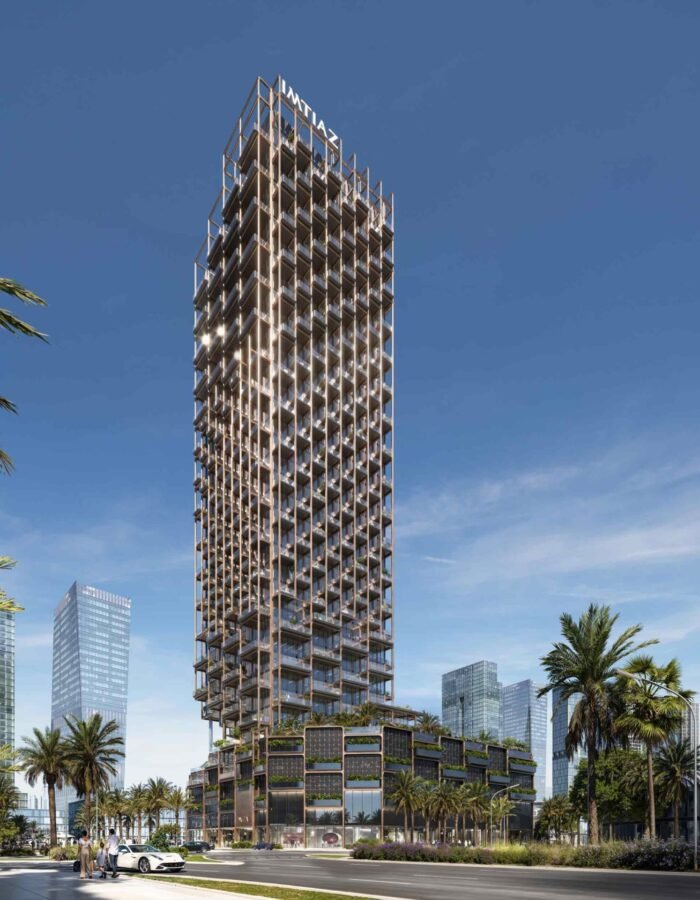 Luxury high-rise tower with geometric facade, palm lined streets, modern podium levels and contemporary urban skyline views