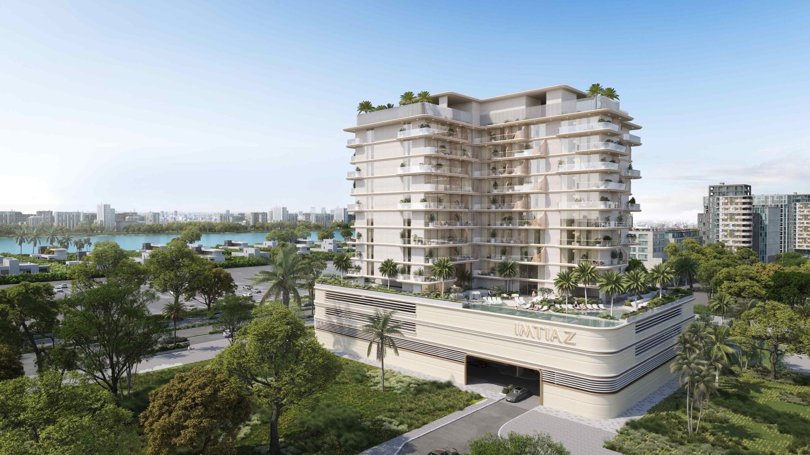 Luxury residential building with modern balconies, landscaped podium, palm trees and serene waterfront city surroundings